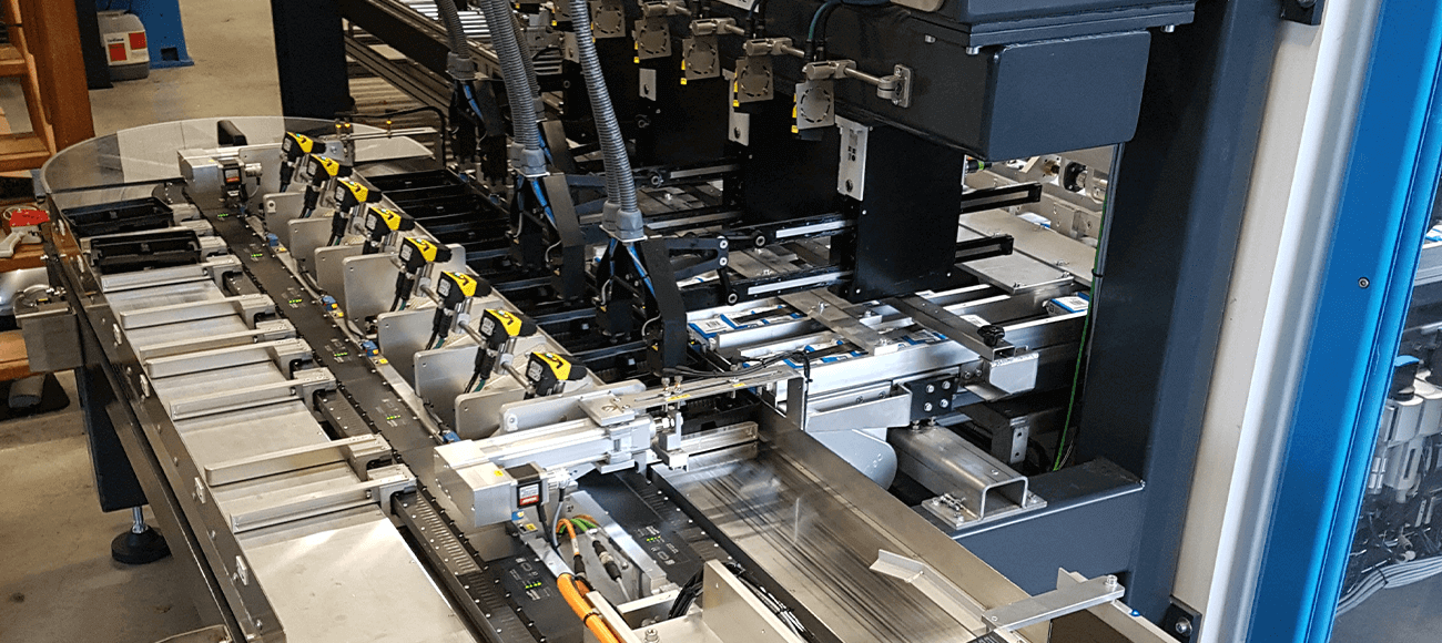 HepcoMotion - Low maintenance packaging solution for printer cartridges allowing on the fly product changes