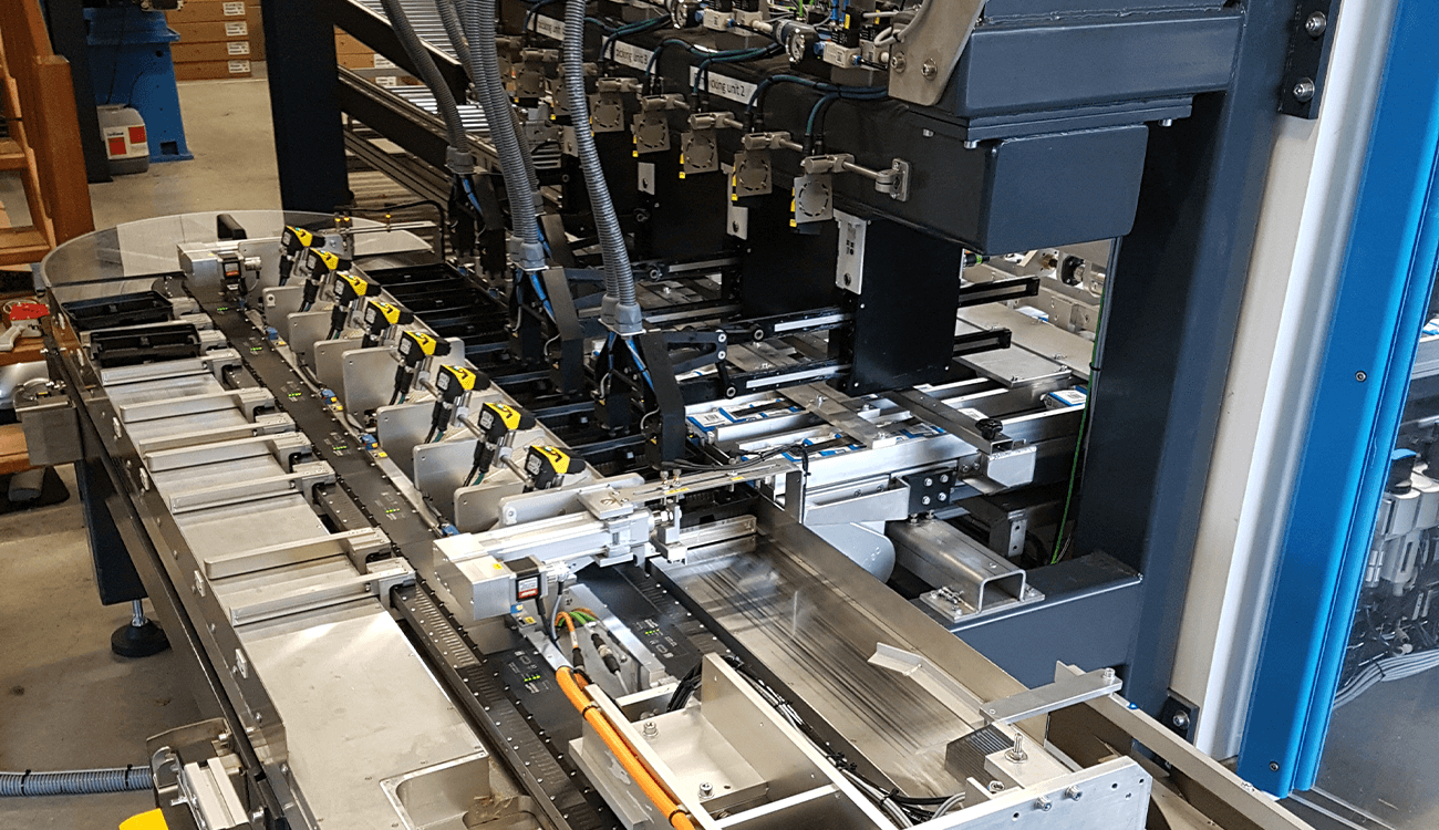 HepcoMotion - Low maintenance packaging solution for printer cartridges allowing on the fly product changes