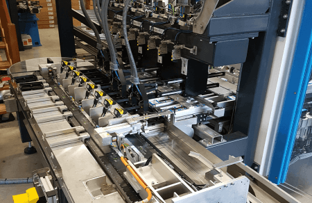 HepcoMotion - Low maintenance packaging solution for printer cartridges allowing on the fly product changes