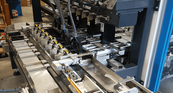 HepcoMotion - Low maintenance packaging solution for printer cartridges allowing on the fly product changes