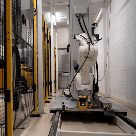 HepcoMotion - Low Maintenance, heavy-duty linear guide provides repeatability and precision for an autonomous EV fleet car charging station